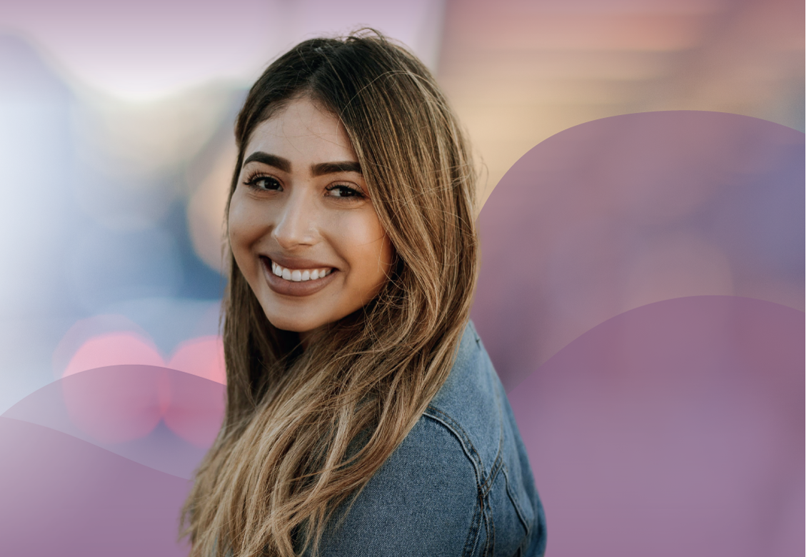 A woman smiling because she knows All Pregnancy Services are Professional & Confidential at Pregnancy Care Center in Fresno, California