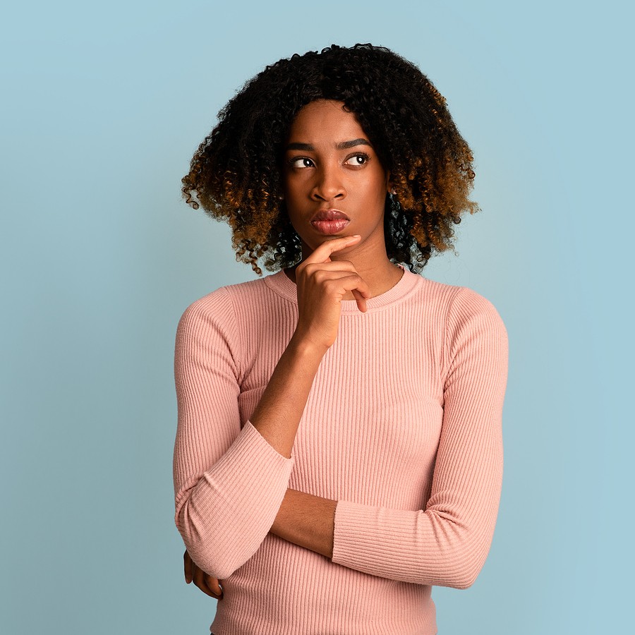 A woman wondering, "How Does the Abortion pill Work?"